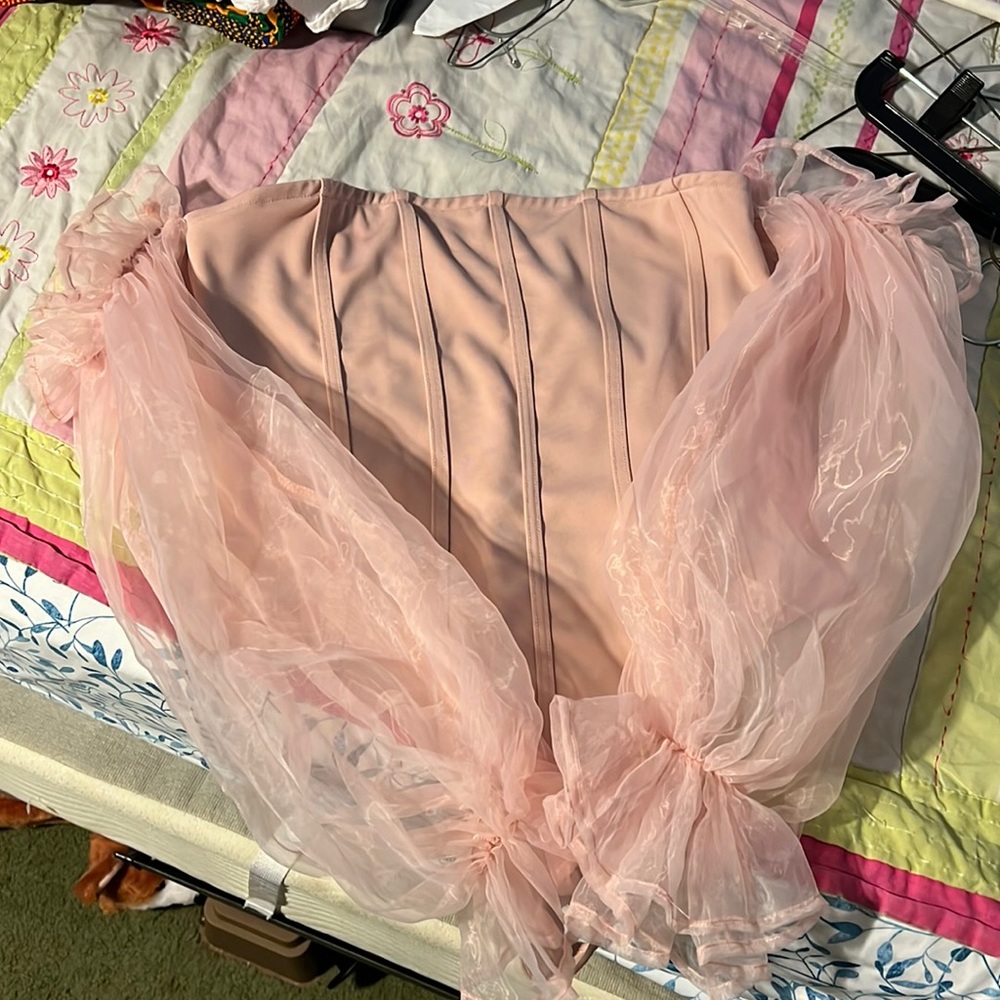 Pink off shoulder body suit